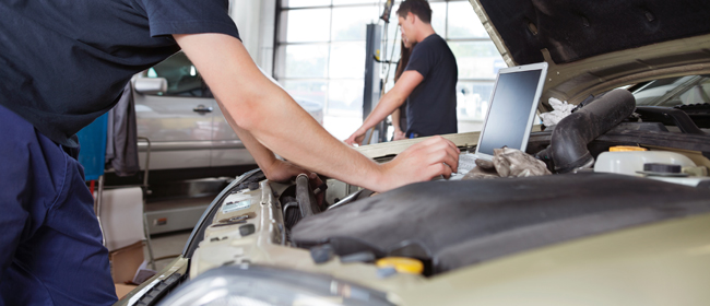 Mechanic working on a car